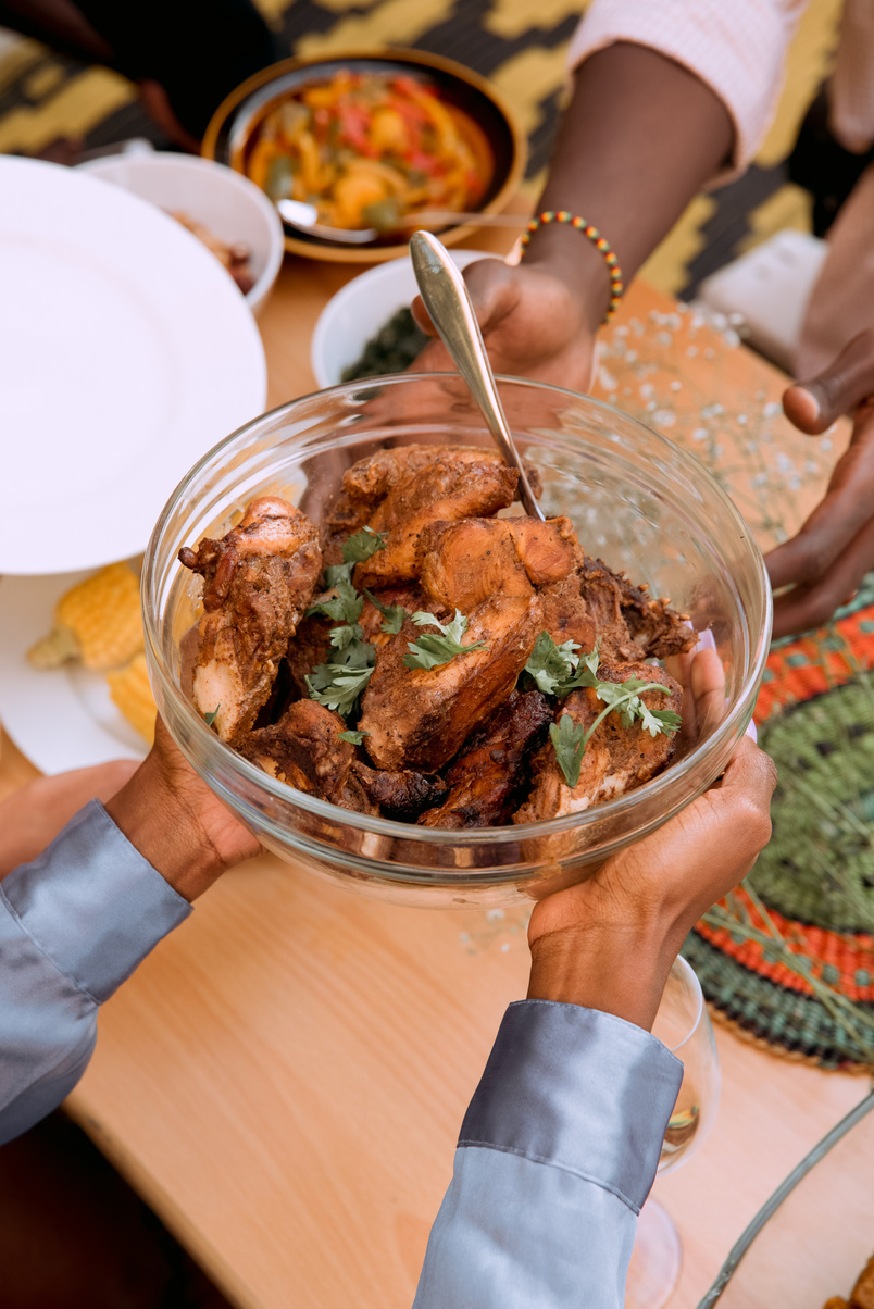 Person Holding Clear Glass Bowl With Food